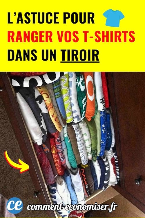 T-shirts colorés pliés verticalement et rangés dans un tiroir en bois.