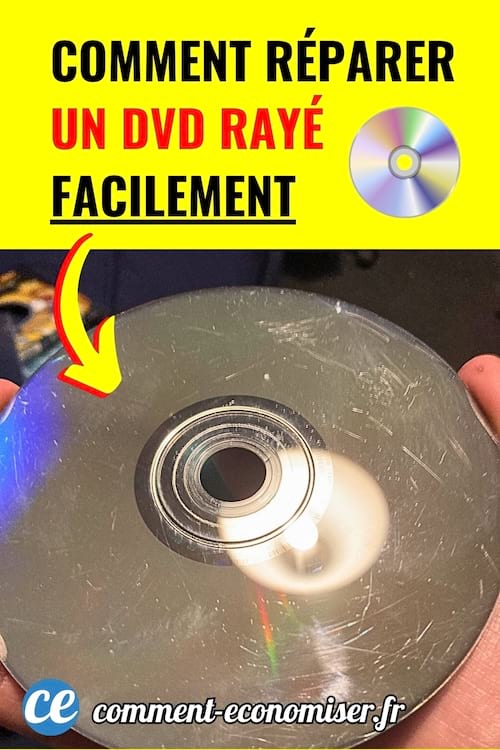Main tenant un DVD rayé avec une flèche jaune pointant les rayures.