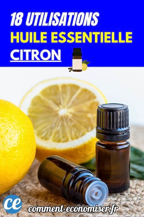 Deux flacons d’huile essentielle de citron posés devant un citron coupé en deux.