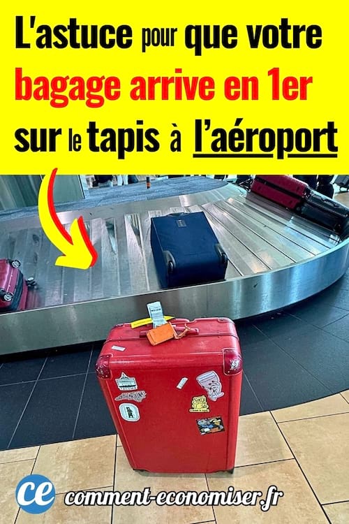 Une valise rouge qui est arrivé en 1er sur le tapis de l'aéroport
