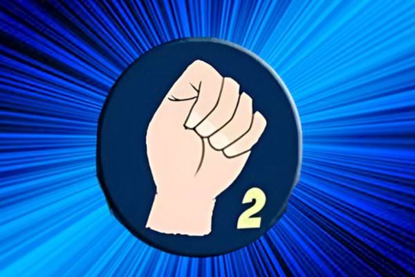 le poing serré avec le pouce à l'intérieur