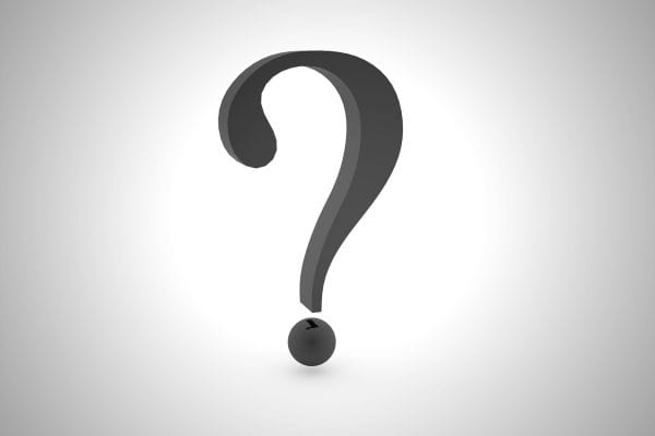 Un grand point d’interrogation gris fonce flotte sur un fond clair et exprime une question.