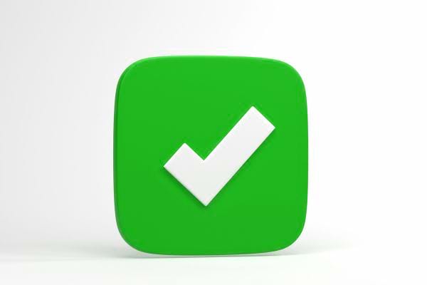 Symbole vert montrant une coche blanche indiquant une validation reussie.