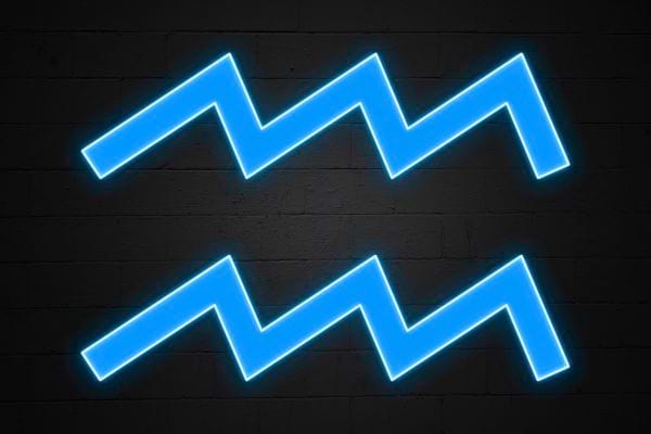 Le symbole du verseau apparait en neon bleu. Il evoque innovation liberte et originalite.