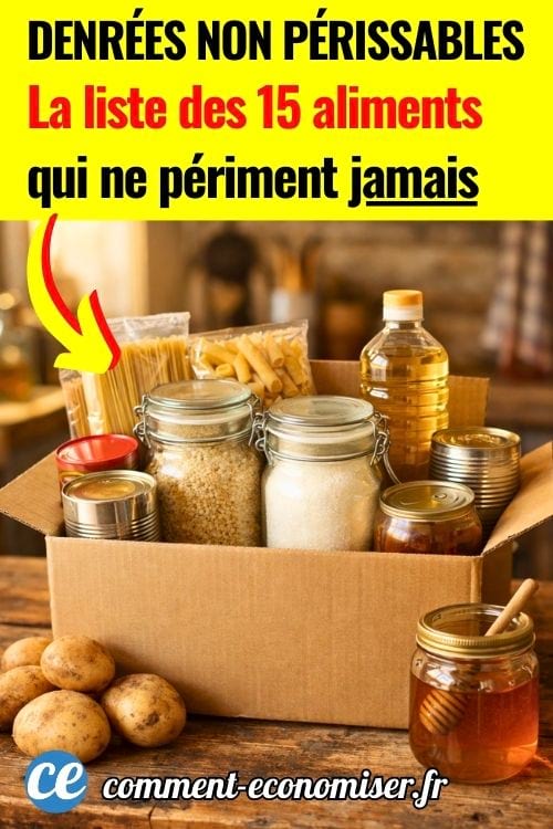 Boîte avec pâtes, riz, sucre, conserves, huile et miel, aliments non périssables sur table en bois