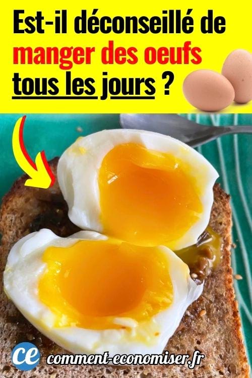 Deux &oelig;ufs mollets au jaune coulant pos&eacute;s sur une tranche de pain grill&eacute;, vue en gros plan.