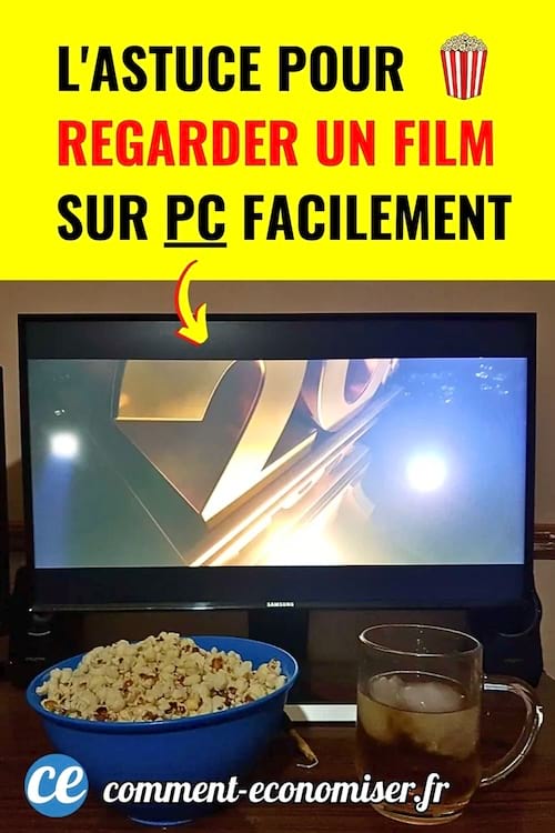 Un ordinateur affiche un film avec popcorn et boisson pour montrer une astuce pour regarder un film sur PC.