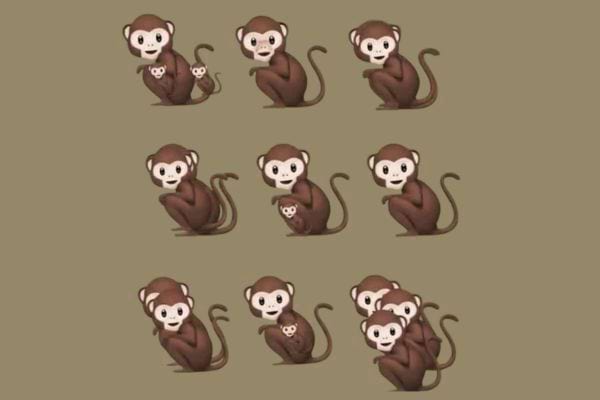 Des singes bruns dessin&eacute;s, dont certains portent un petit, sur fond brun clair.