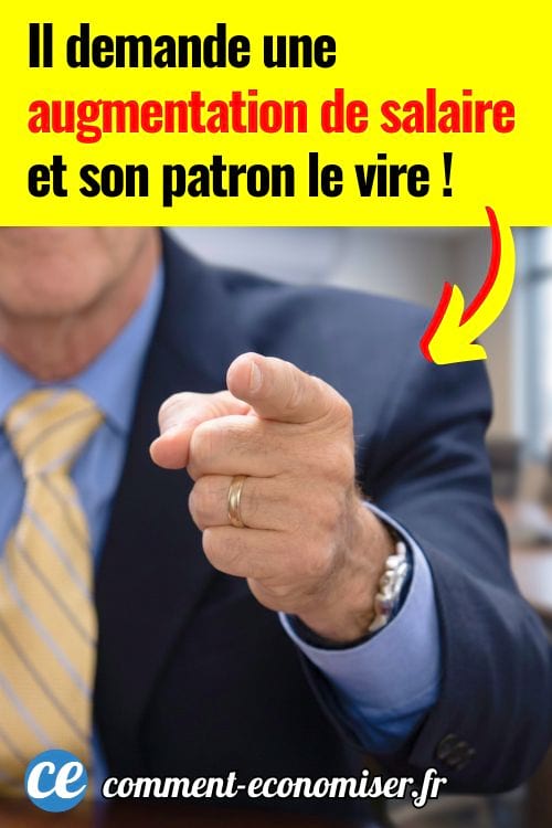 Homme en costume pointant du doigt vers l&rsquo;objectif dans un bureau flou.