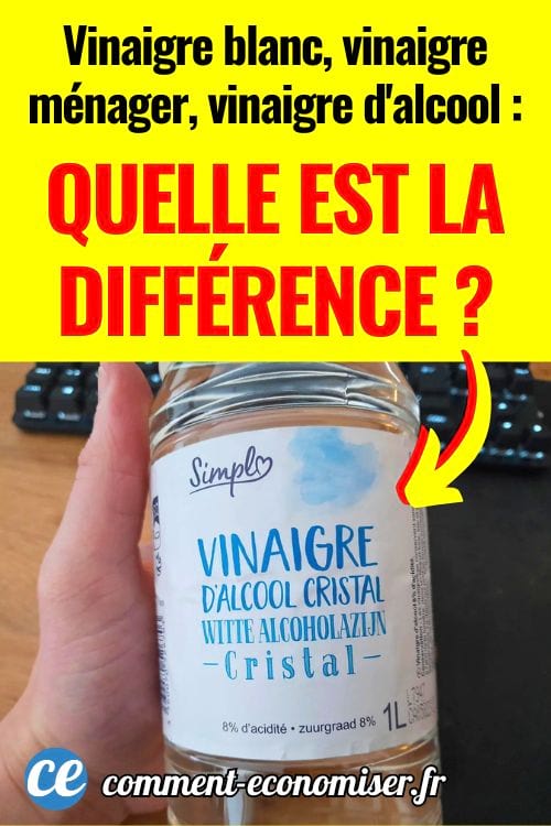 Main tenant une bouteille de vinaigre d’alcool cristal.
