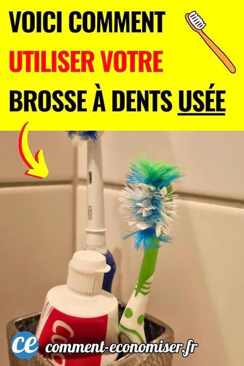 une brosse à dents usée dans un verre avec du dentifrice