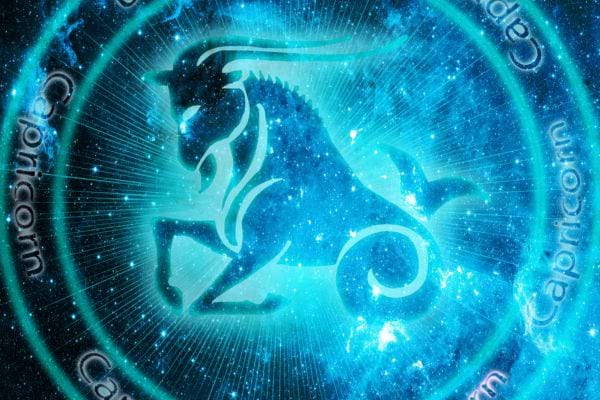signe du zodiaque du capricorne dans un cercle bleu sur fond noir &eacute;toil&eacute;