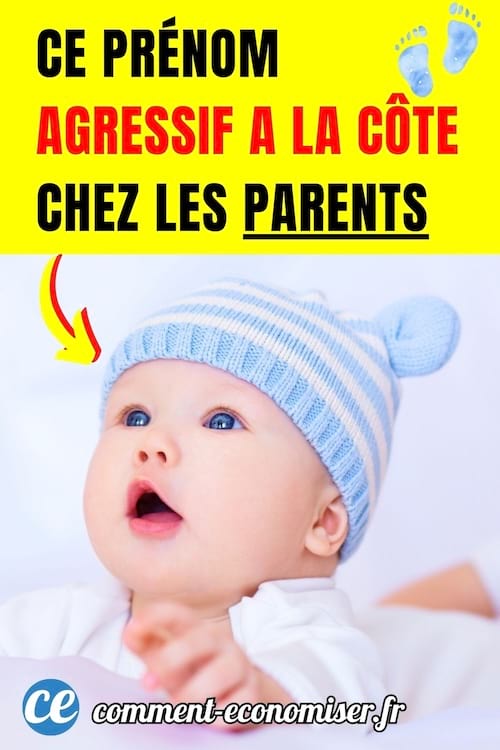 un b&eacute;b&eacute; gar&ccedil;on aux yeux bleus avec un bonnet bleu et blanc