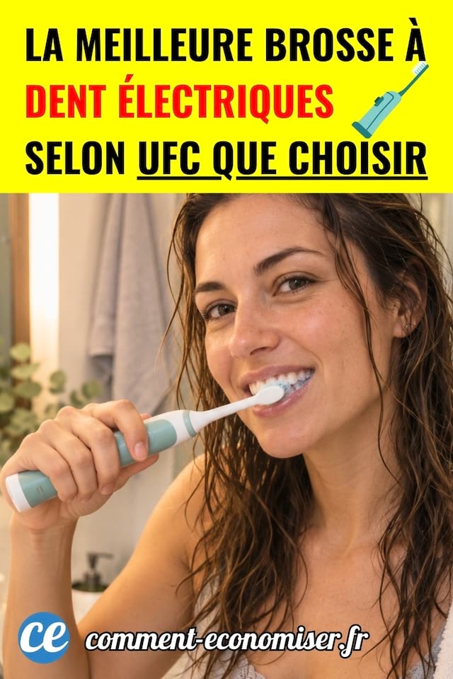 Une femme se brosse les dents avec une brosse &agrave; dents &eacute;lectriques