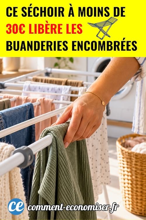 une femme qui &eacute;tend du linge sur un &eacute;tendoir