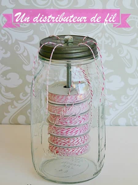 un distributeur de fil dans un bocal