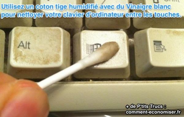 Reinigen Sie die Tastatur mit einem Wattestäbchen