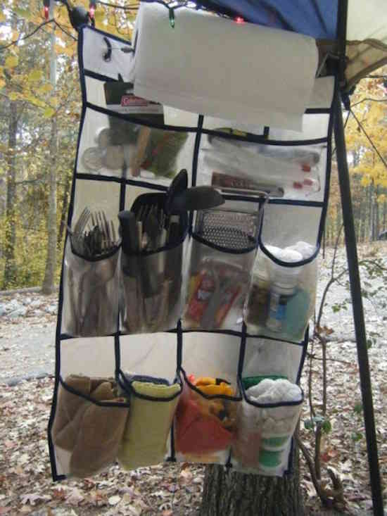 Did you know that a simple wall-mounted shoe rack can help you stay organized while camping?