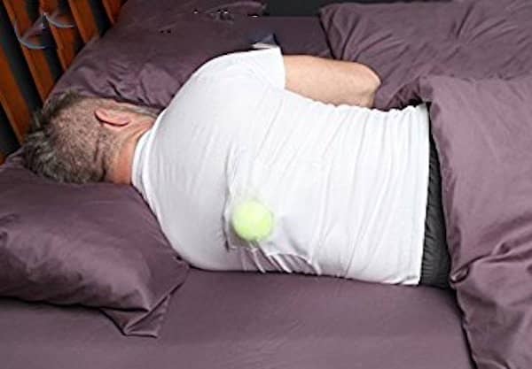 sew a tennis ball in the back of your t-shirt to prevent snoring