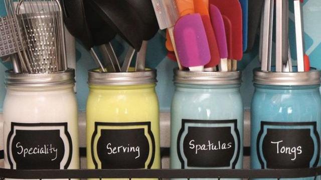 Use glass jars to store utensils
