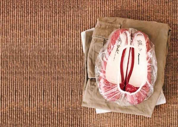 Utilisez un bonnet de douche pour ranger bonnet de douche dans la valise