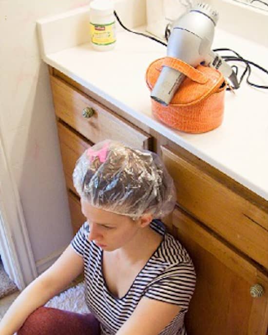 How to heat a shower cap after applying a conditioning mask for dry and damaged hair?