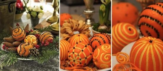 decoração tradicional de mesa de Natal com laranjas esculpidas e decoradas