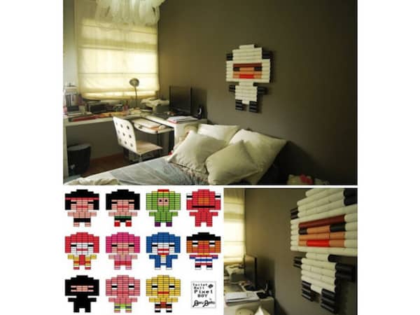 une décoration en forme de robot réalisée avec des rouleaux de carton PQ