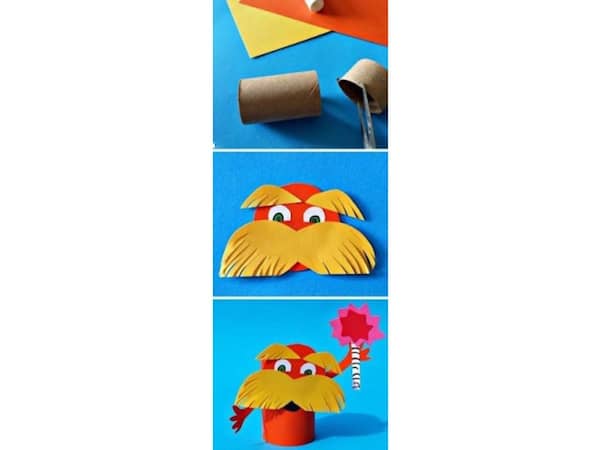 un petit bonhomme des îles fait avec quelques bouts de carton et de feuille