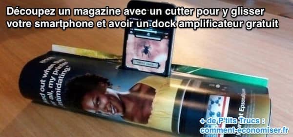 Découpez un magazine avec un cutter pour y glisser votre smartphone et avoir un dock amplificateur gratuit